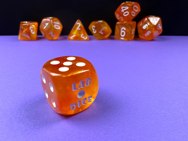 Chessex 7-Die Lab Dice Set: Borealis Blood Orange & White Luminary (with bonus die)